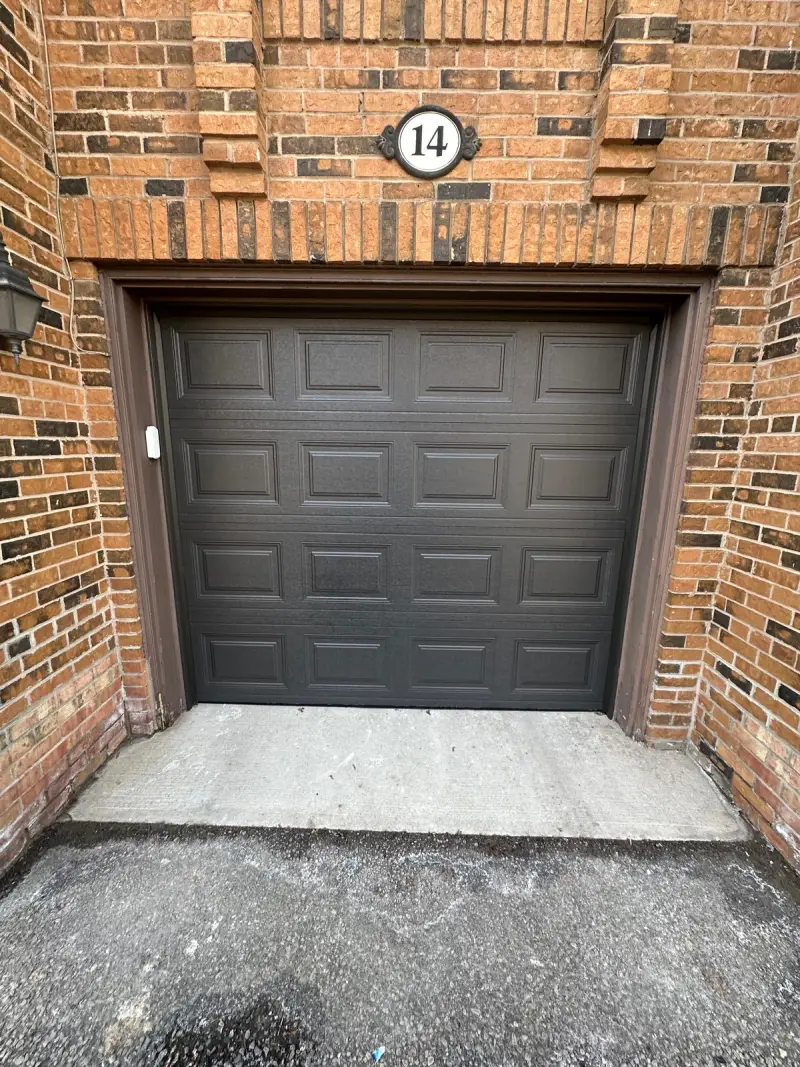 Close up of torsion spring service